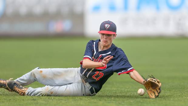 Tupelo Christian's Logan White (22) attempts to field a ground ball at second. Tupelo Christian and Resurrection played in game 2 of the MHSAA Class 1A Baseball Championship on Thursday, June 3, 2021 at Trustmark Park. Photo by Keith Warren